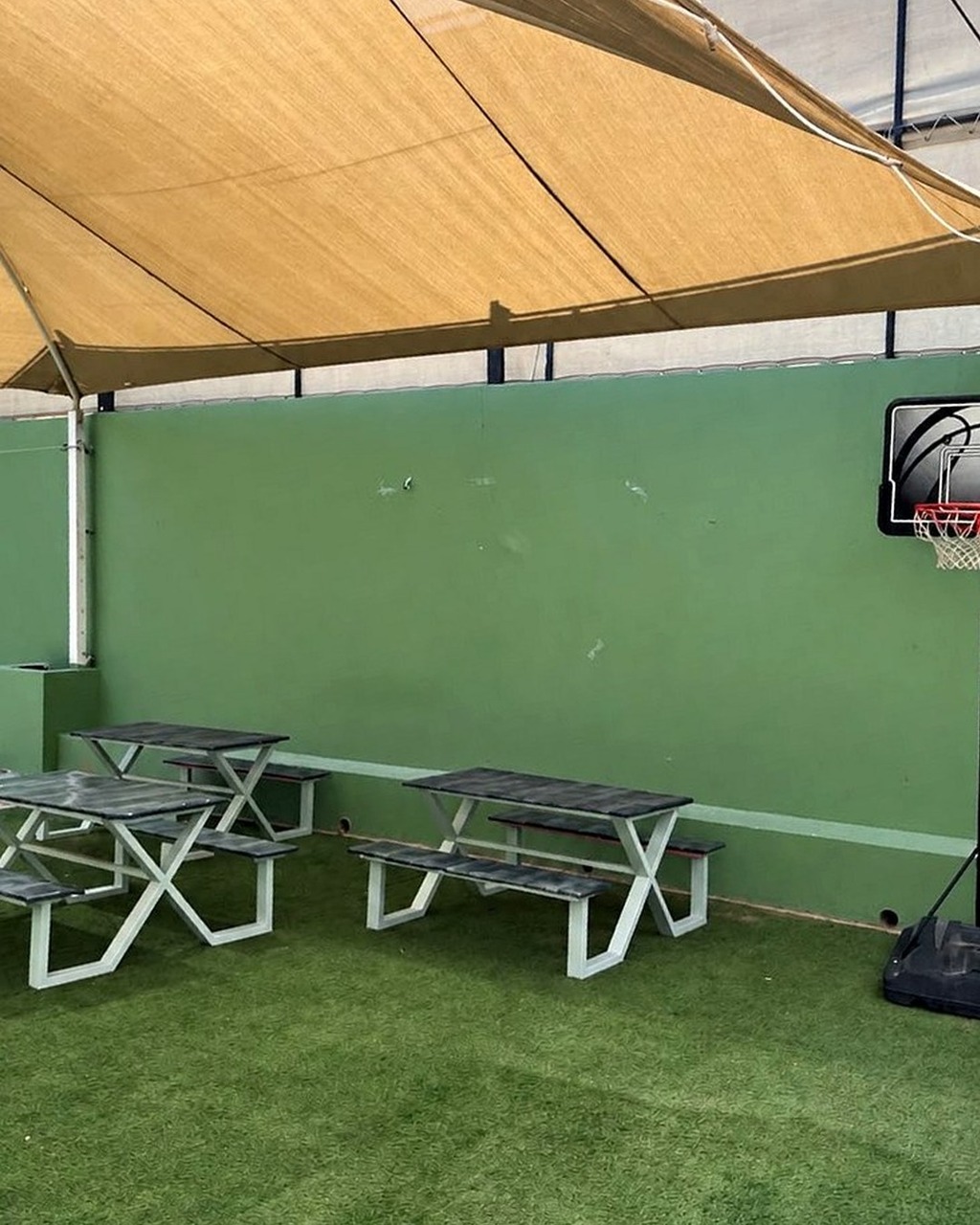 Shaded Outdoor Seating at Al-Nasr International School